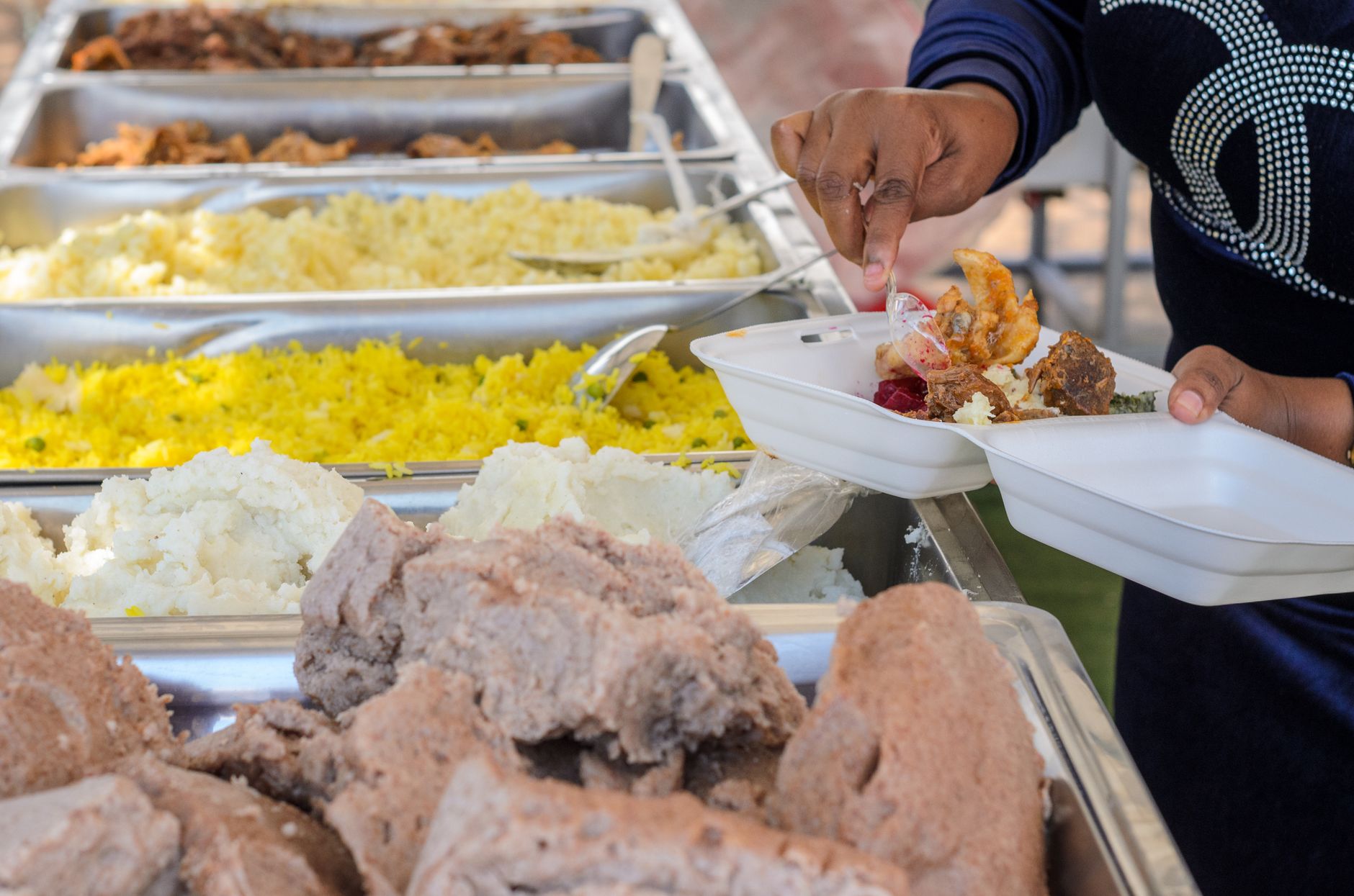close up of taking food from self service
